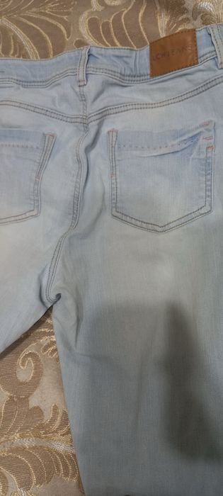 Женские джинсы брюки