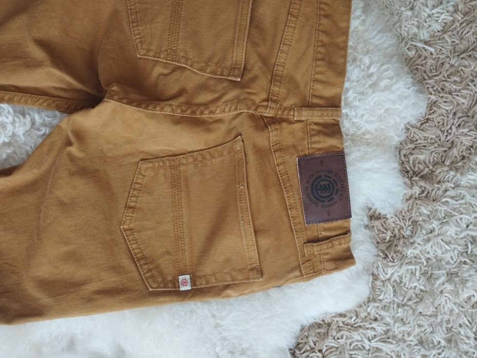 Pantaloni pană de culoare maro