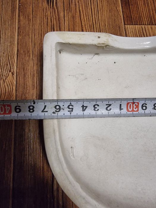 Крышки сливного бачка унитаза