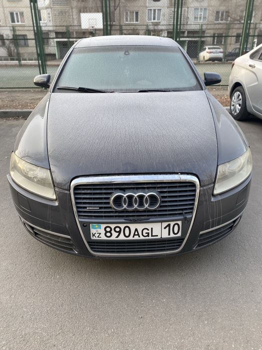 Автомобиль Ауди А6 темно серый металлик