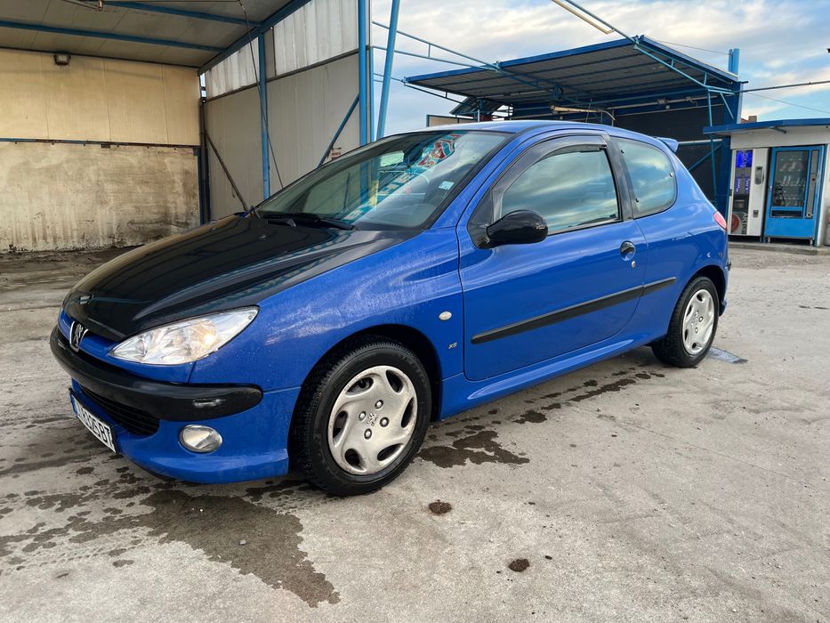 Peugeot  206 1.4 75 коня