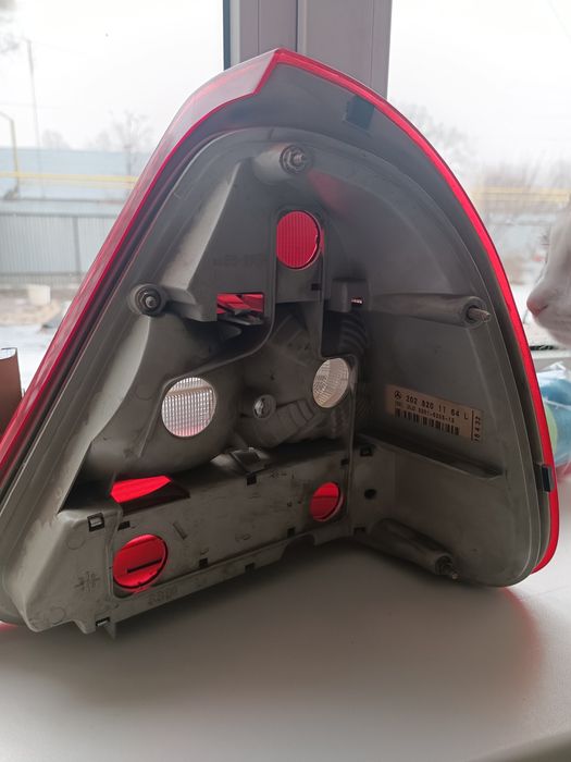 Фонарь левый c280 оригинал