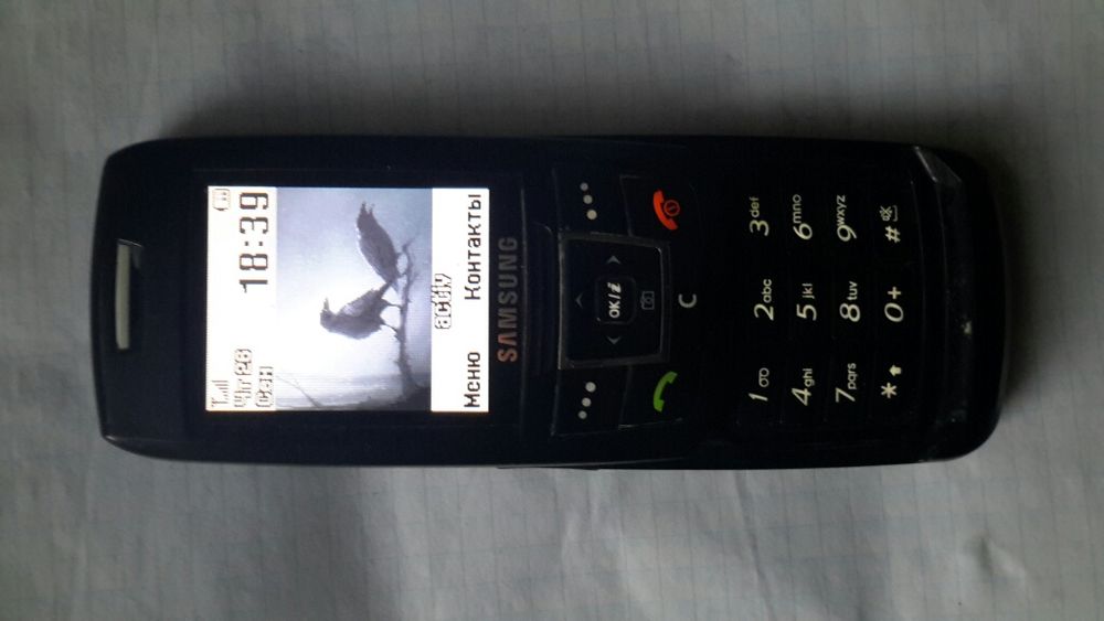 Сотовый телефон Самсунг.