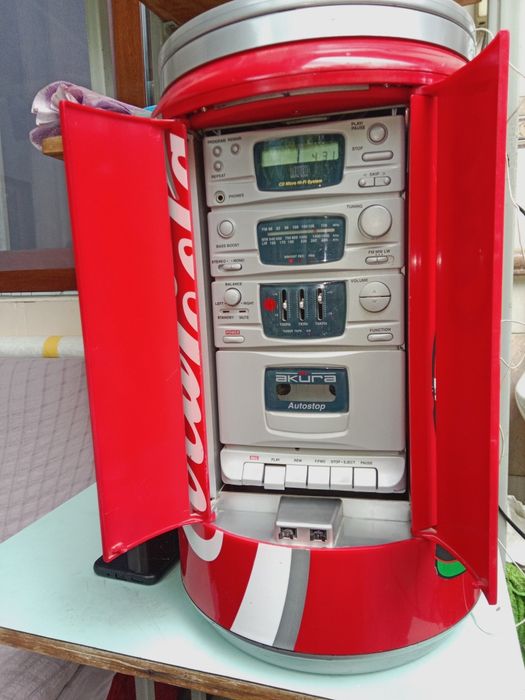 Antikvar muzikaniy sentr disk radio kaseta oʻqidi