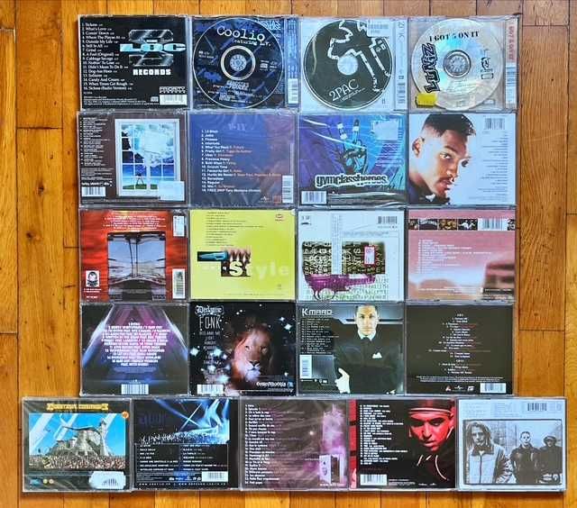 CD orig hip hop: Snoop Dogg, 50 Cent, Beastie Boys, Akon, Jay-Z, W. Jean, Coolio, 2Pac