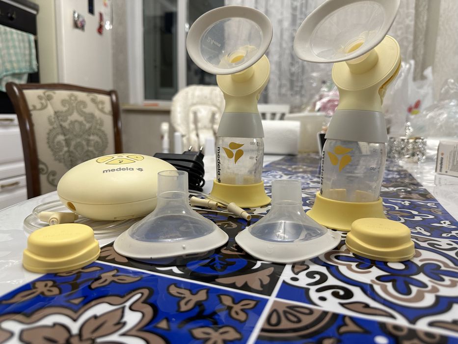 Молокоотсос Medela Swing Maxi Flex