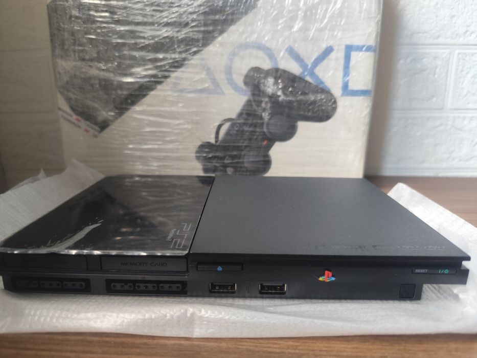 Новая PS2 SLIM..