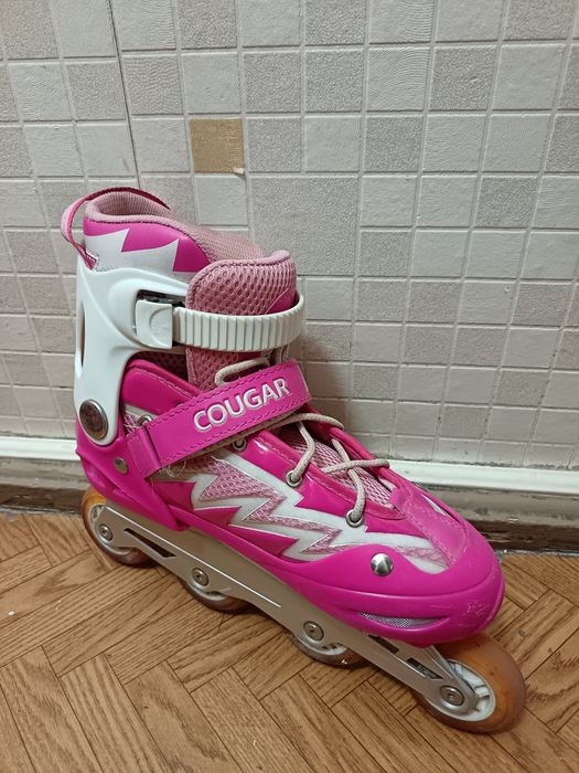 Роликовые коньки