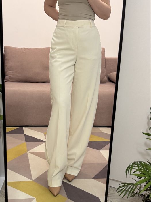 Pantaloni loose fit eleganți butter cream din stofă cu vipușca Zara XS