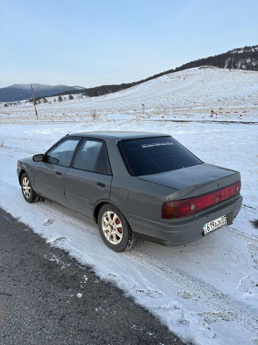 Мазда 323BG 1990