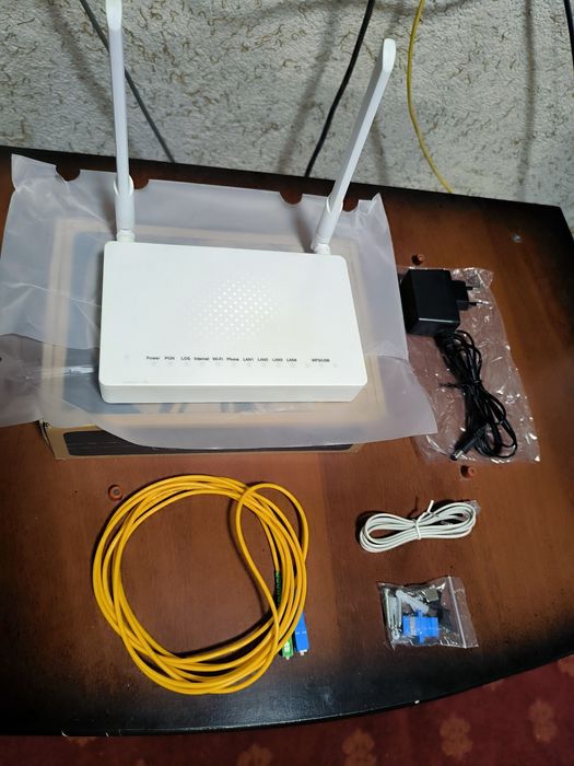 Вай фай интернет Роутер Gpon optika тезда сотилади ҳолати янги
