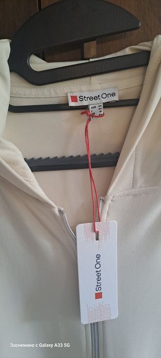 Нова Бяла,красива,елегантна жилетка,купена от Германия,не е носена