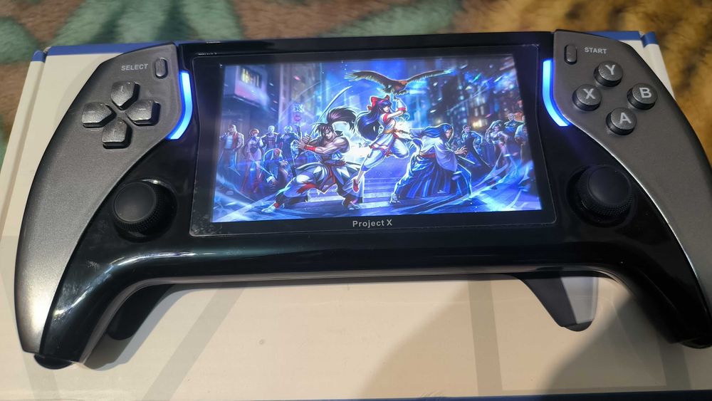 Продам портативную консоль Project X.