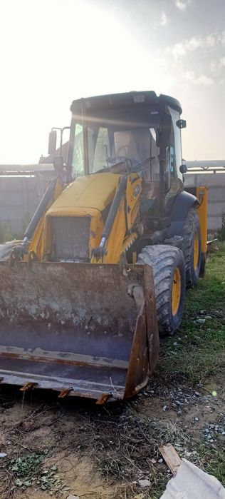 Экскаватор погрузчик 3в1