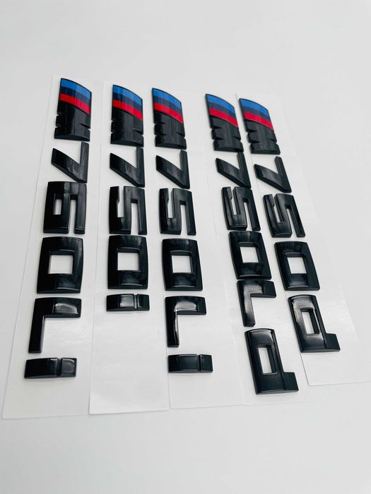 Emblema compatibila BMW M750Ld negru