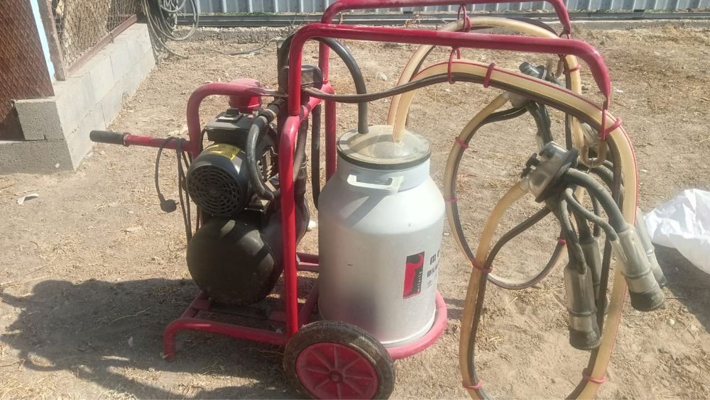 Двойной доильный аппарат