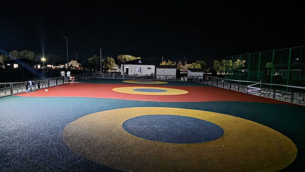 Резиновые покрытие, тартан