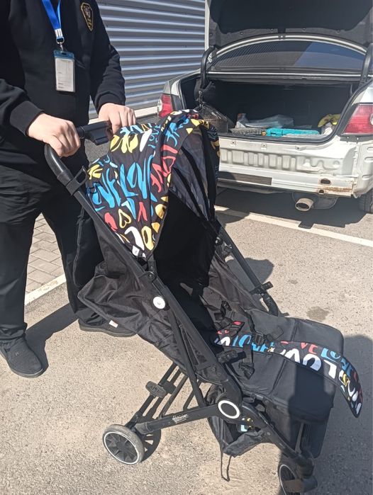 Детская прогулочная коляска