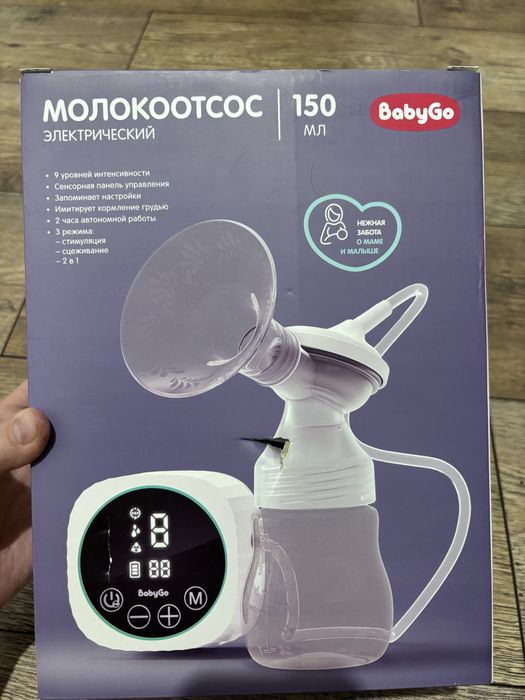 Электрический молокоотсос