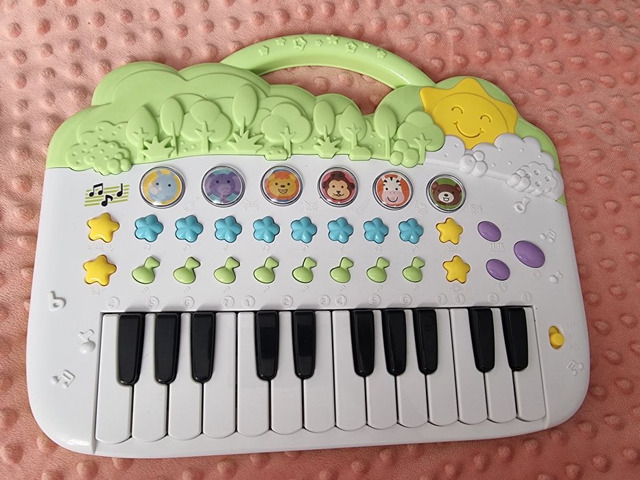 Jucarie în perfecta stare de funcționare cu sunete, cantece și animale