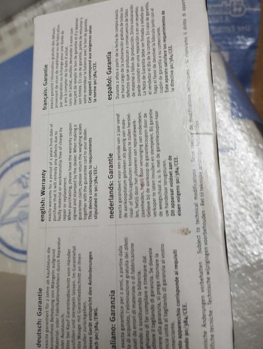 cântar de bucătărie Exacta by Soehnle, cu un design alb și un cadran care masoara cu precizie in kg si lb