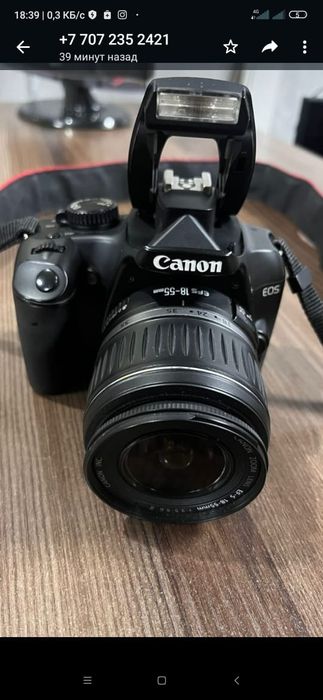 Штатив и фотоаппарат