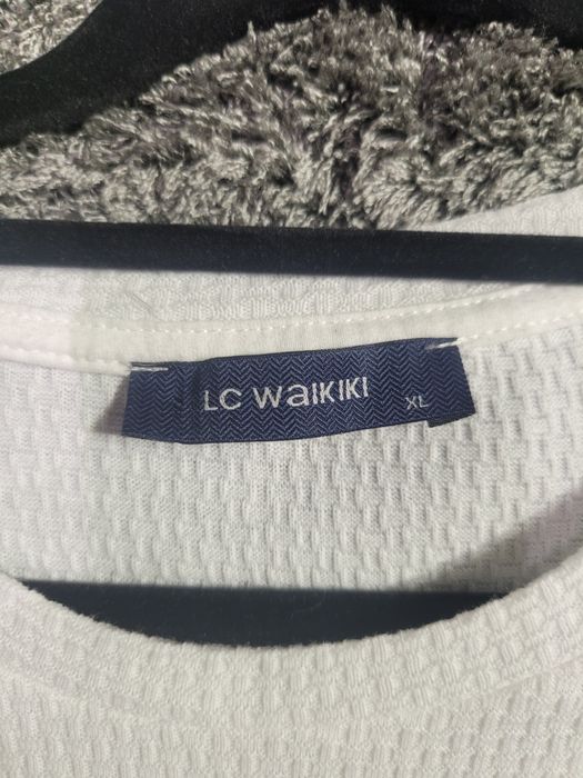 Продам белую футболку