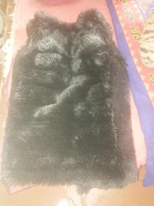 Продам желетку меховую