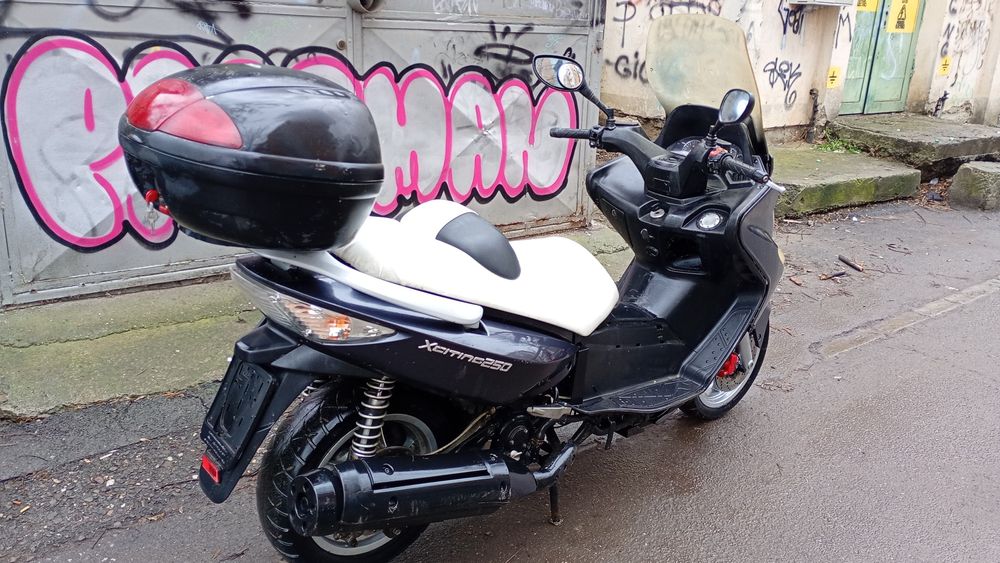 Vind convenabil Kymco Xaiting