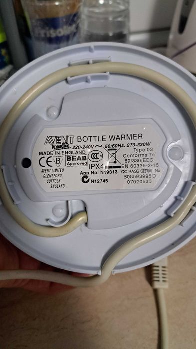 Нагревател за бебешки шишета .