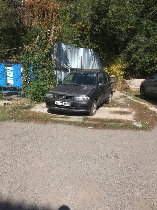 Мазда Демио