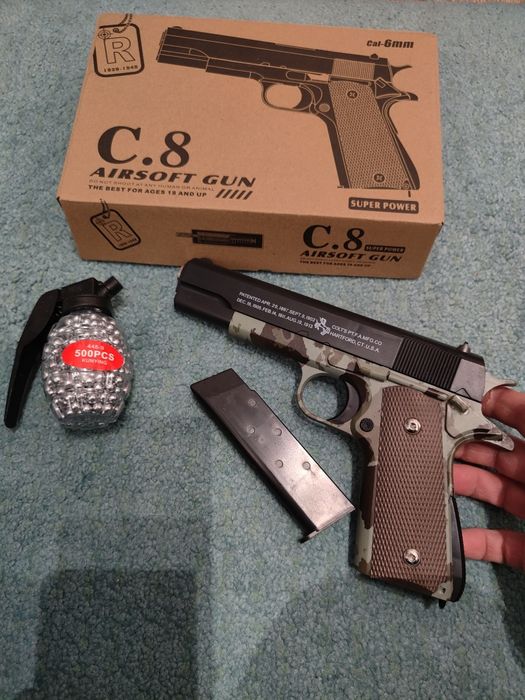 Pistol cu bile propulsie arc + 500bile plastic abs