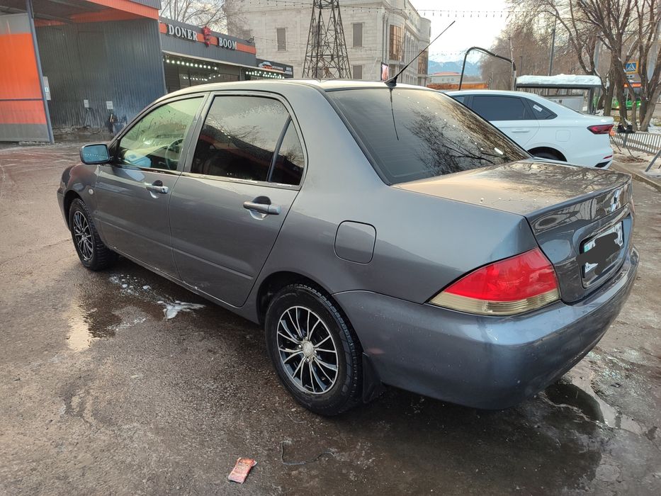 Митсубиси Лансер