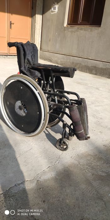 Инвалидная коляска