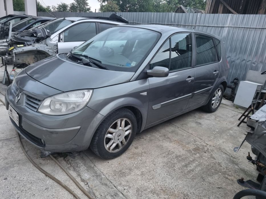 Amortiizor stanga față cu arc si flansa cu rulment renault scenic 2