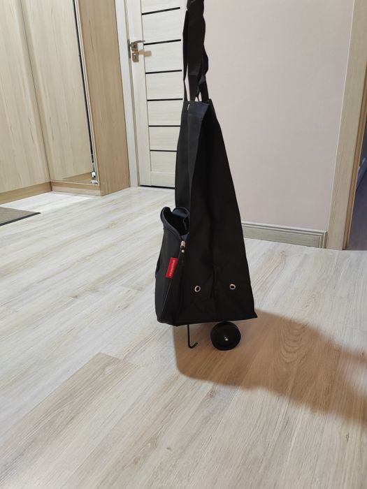 Сумка на колёсах, США