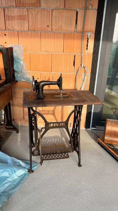 Mașina de cusut singer