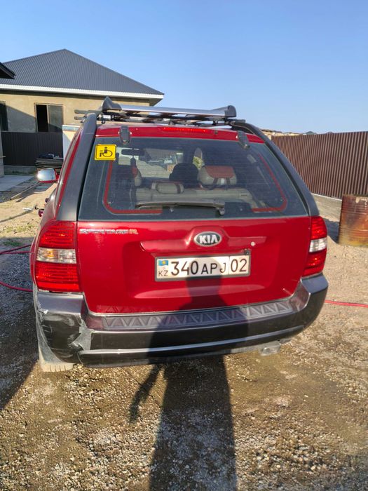 Kia Sportage 2 поколения
