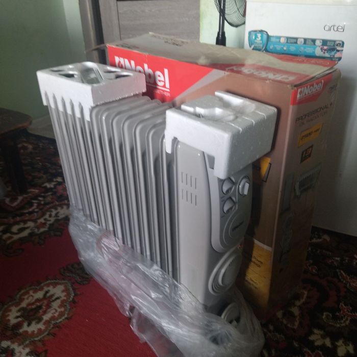 Масляный обогреватель