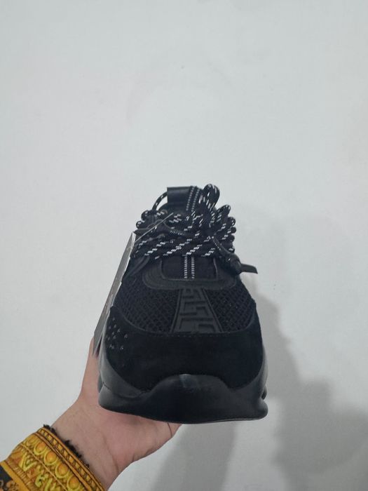 Versace chain reaction