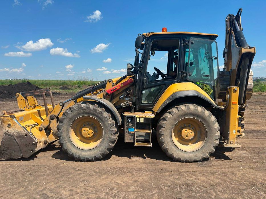 Buldoexcavator Caterpillar