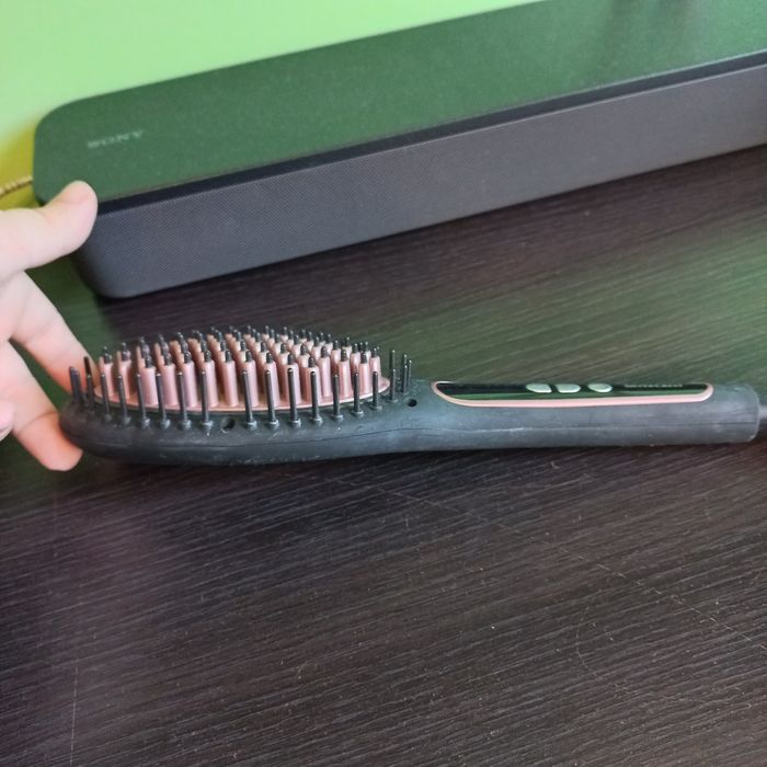 Електрическа четка за изправяне на коса