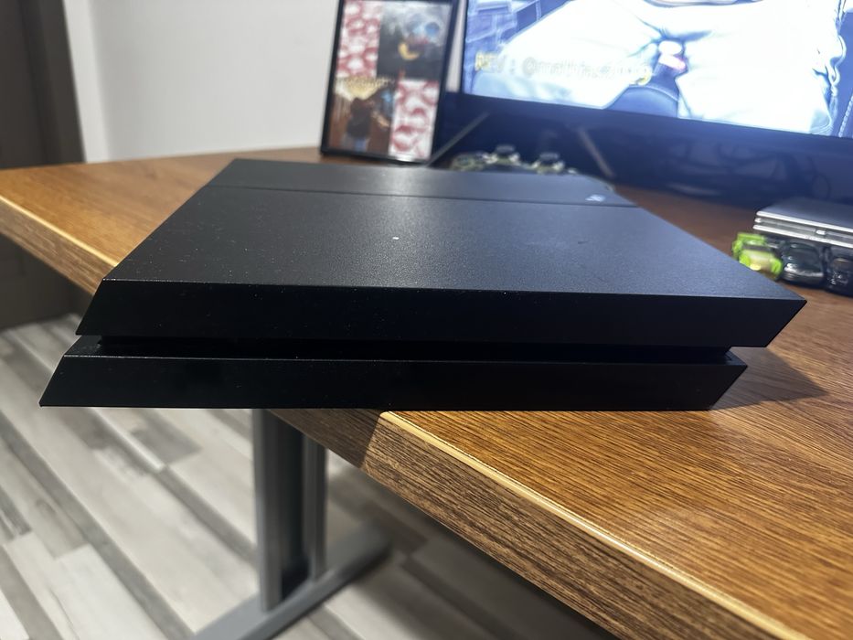 PlayStation 4 1T 2controllere 6 jocuri + gta nu este in poza