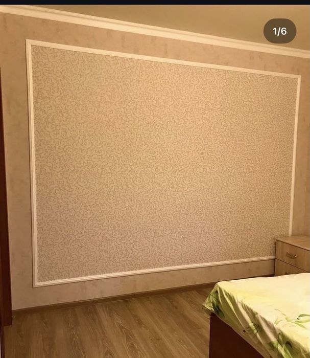 Поклейка обоев.