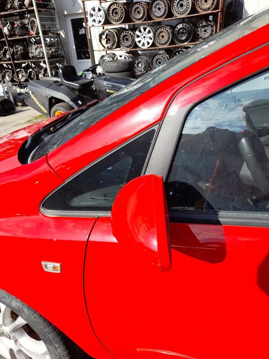 Oglinda stanga Opel Corsa D ( 2 usi ) cod Z547 rosu