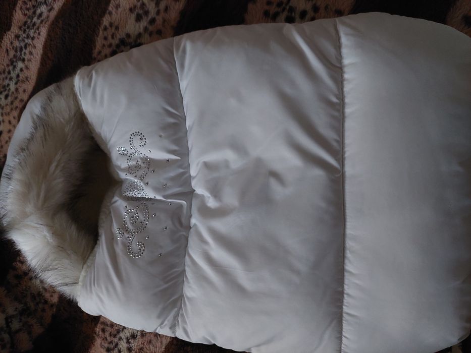 Продам детский конверт и комбинезон