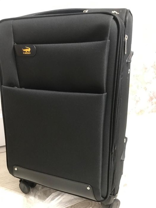 Продам новый чемодан