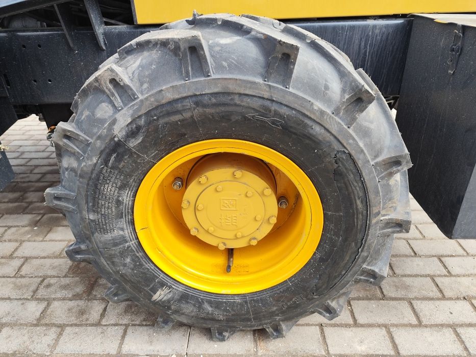 Погрузчик 938 новый без пробег