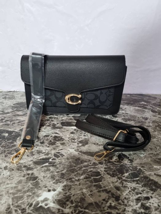 Geanta coach de mana