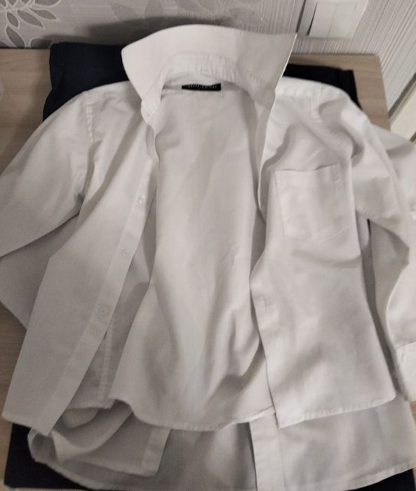 Продам рубашки и брюки на 7-9 лет